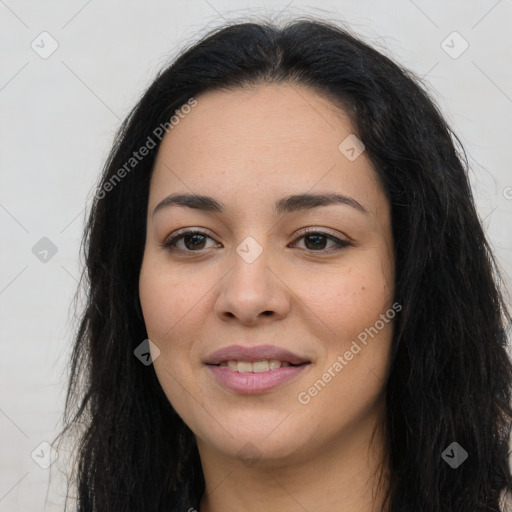 Joyful latino young-adult female with long  brown hair and brown eyes