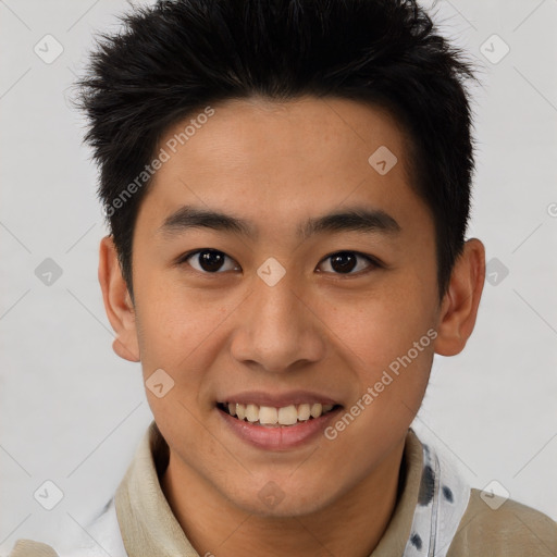 Joyful asian young-adult male with short  brown hair and brown eyes