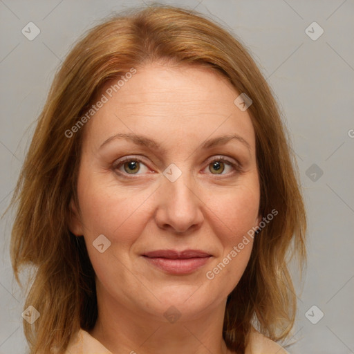 Joyful white adult female with medium  brown hair and blue eyes