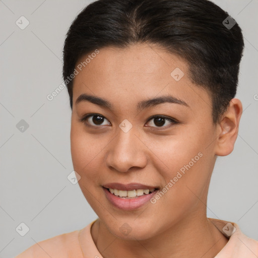 Joyful white young-adult female with short  brown hair and brown eyes