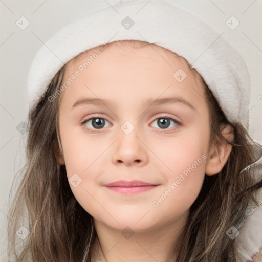 Joyful white child female with long  brown hair and grey eyes