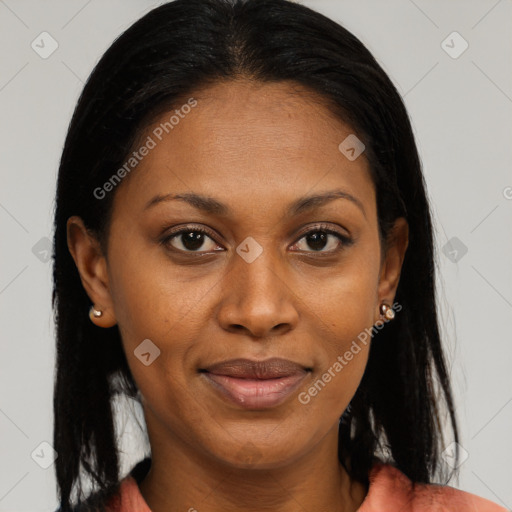 Joyful black young-adult female with long  brown hair and brown eyes