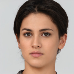 Neutral white young-adult female with short  brown hair and brown eyes