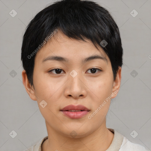 Joyful asian young-adult female with short  brown hair and brown eyes