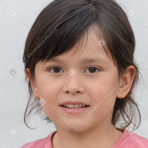 Joyful white child female with medium  brown hair and brown eyes