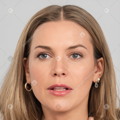 Joyful white young-adult female with long  brown hair and grey eyes