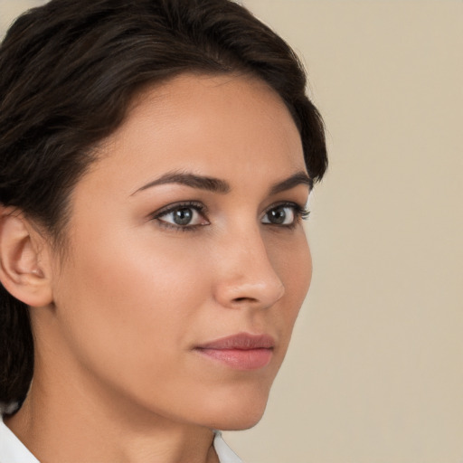 Neutral white young-adult female with short  brown hair and brown eyes