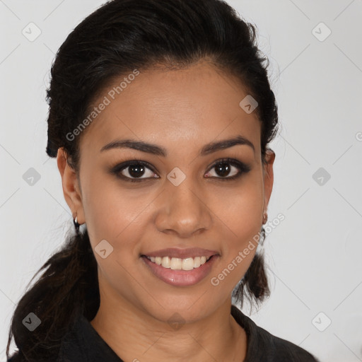 Joyful latino young-adult female with medium  brown hair and brown eyes