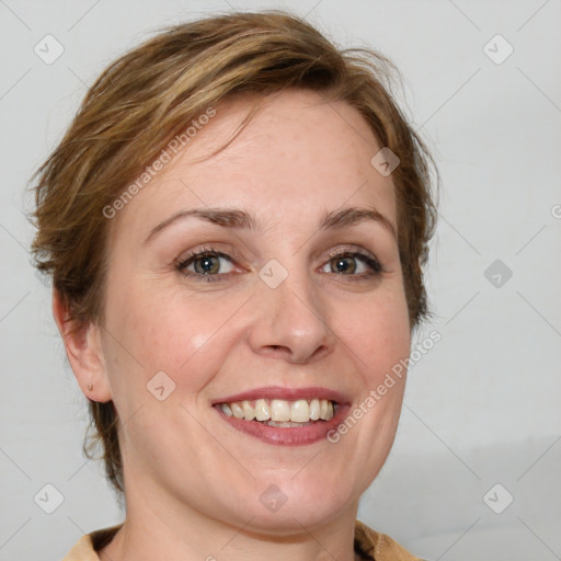 Joyful white young-adult female with medium  brown hair and blue eyes