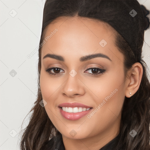 Joyful white young-adult female with long  black hair and brown eyes