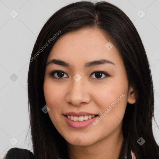 Joyful latino young-adult female with long  black hair and brown eyes