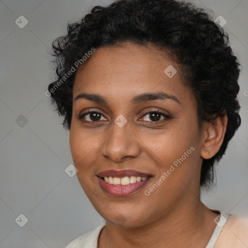 Joyful latino young-adult female with short  brown hair and brown eyes