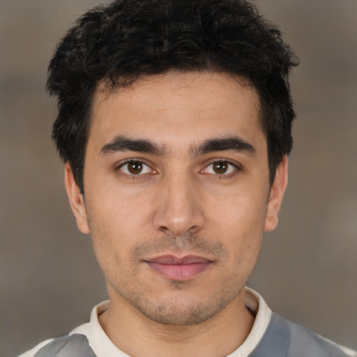 Neutral white young-adult male with short  black hair and brown eyes
