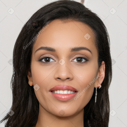 Joyful latino young-adult female with long  black hair and brown eyes