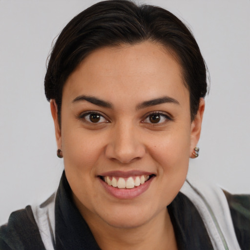 Joyful white young-adult female with medium  brown hair and brown eyes