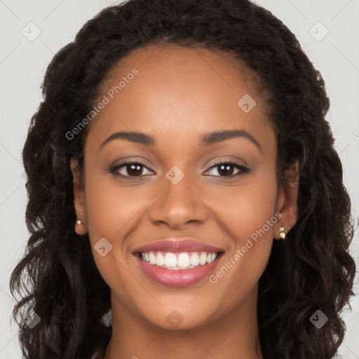 Joyful latino young-adult female with long  brown hair and brown eyes