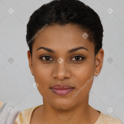 Joyful black young-adult female with short  black hair and brown eyes