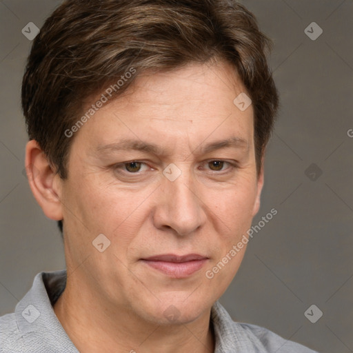 Joyful white adult male with short  brown hair and grey eyes