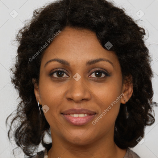 Joyful black young-adult female with medium  brown hair and brown eyes