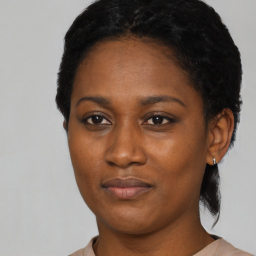 Neutral black young-adult female with short  black hair and brown eyes