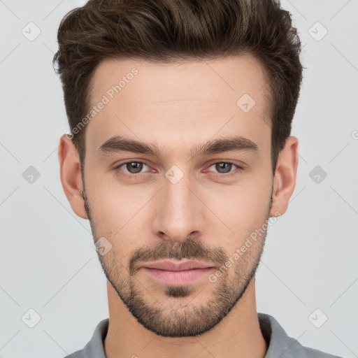 Neutral white young-adult male with short  brown hair and brown eyes