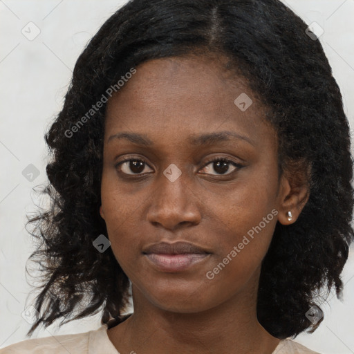 Neutral black young-adult female with medium  black hair and brown eyes