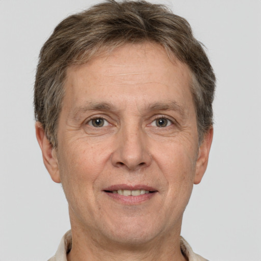 Joyful white middle-aged male with short  brown hair and brown eyes