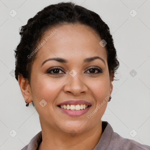 Joyful latino young-adult female with short  brown hair and brown eyes