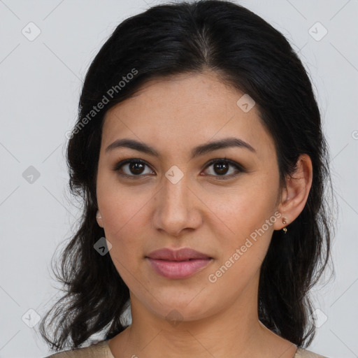 Joyful latino young-adult female with medium  brown hair and brown eyes