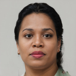 Neutral black young-adult female with short  black hair and brown eyes