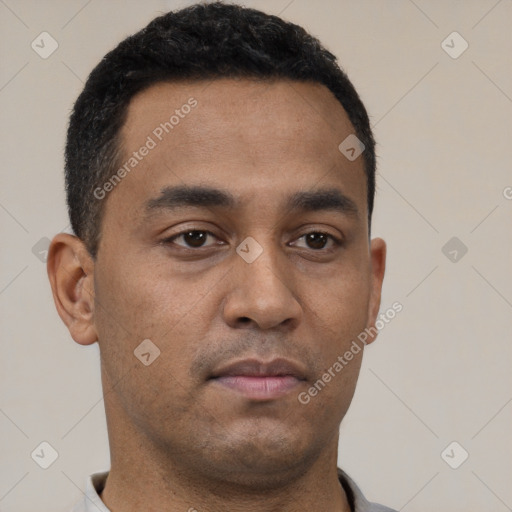 Neutral latino young-adult male with short  brown hair and brown eyes
