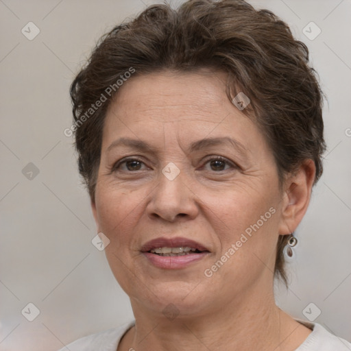 Joyful white adult female with short  brown hair and brown eyes