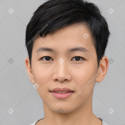 Joyful asian young-adult male with short  black hair and brown eyes