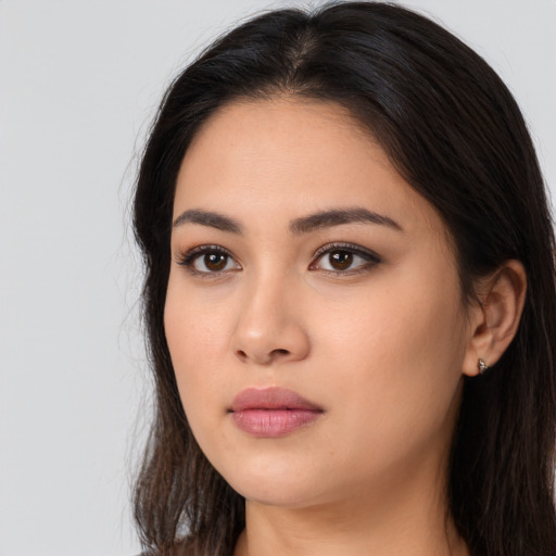 Neutral asian young-adult female with long  brown hair and brown eyes