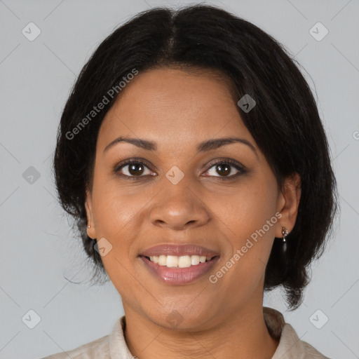 Joyful black young-adult female with medium  brown hair and brown eyes