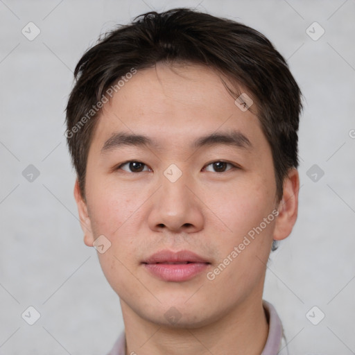 Neutral asian young-adult male with short  brown hair and brown eyes