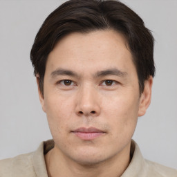 Neutral asian young-adult male with short  brown hair and brown eyes