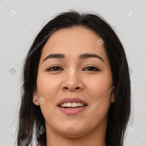 Joyful asian young-adult female with long  brown hair and brown eyes