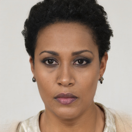 Neutral black young-adult female with short  black hair and brown eyes