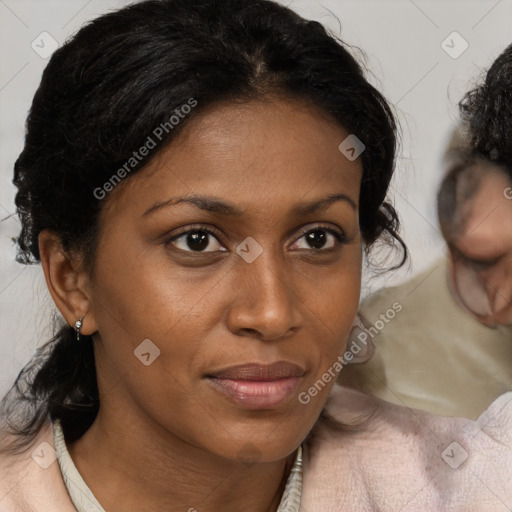 Joyful black young-adult female with medium  brown hair and brown eyes