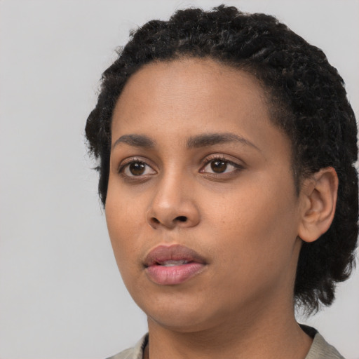 Neutral latino young-adult female with short  black hair and brown eyes