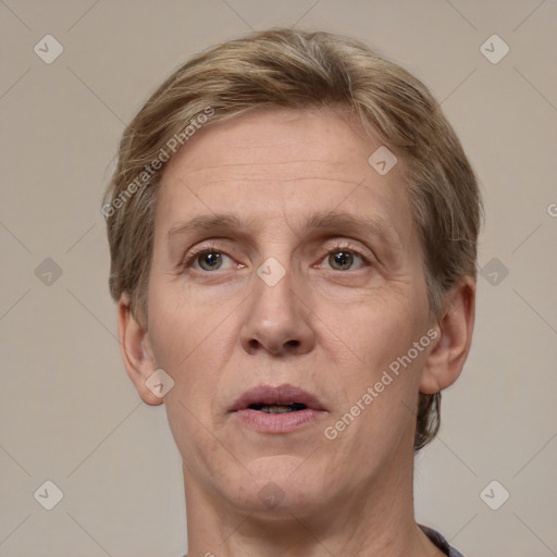 Joyful white adult male with short  brown hair and grey eyes