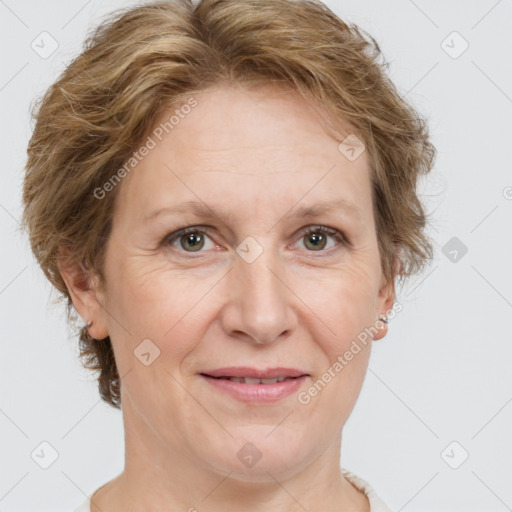 Joyful white adult female with short  brown hair and brown eyes