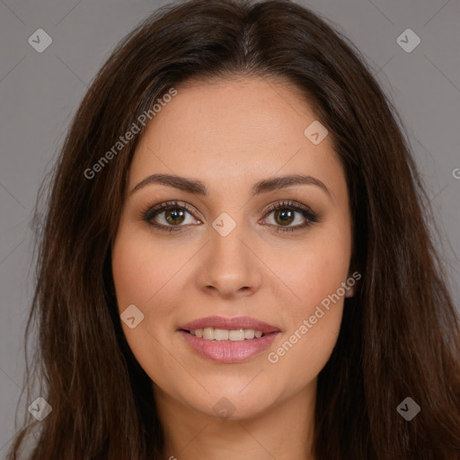 Joyful white young-adult female with long  brown hair and brown eyes