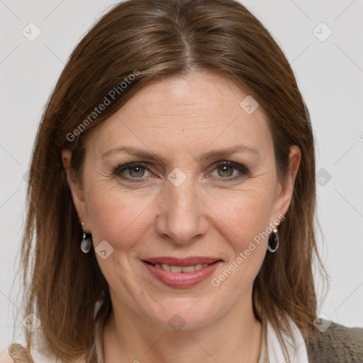 Joyful white adult female with medium  brown hair and grey eyes