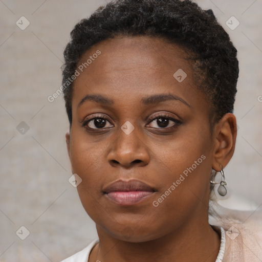 Neutral black young-adult female with short  brown hair and brown eyes