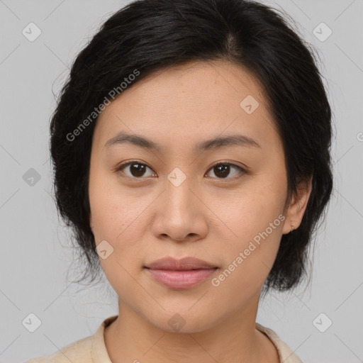 Joyful asian young-adult female with medium  brown hair and brown eyes