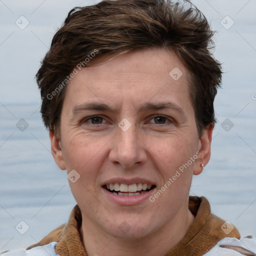 Joyful white adult female with short  brown hair and brown eyes