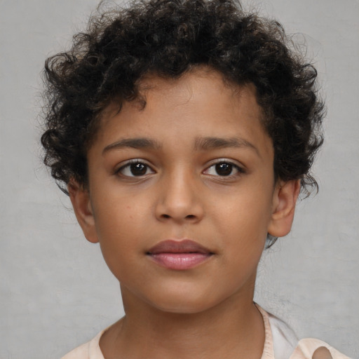 Neutral latino child male with short  brown hair and brown eyes