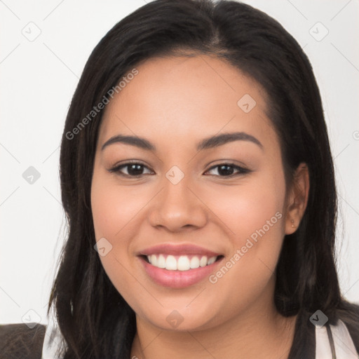 Joyful white young-adult female with long  black hair and brown eyes